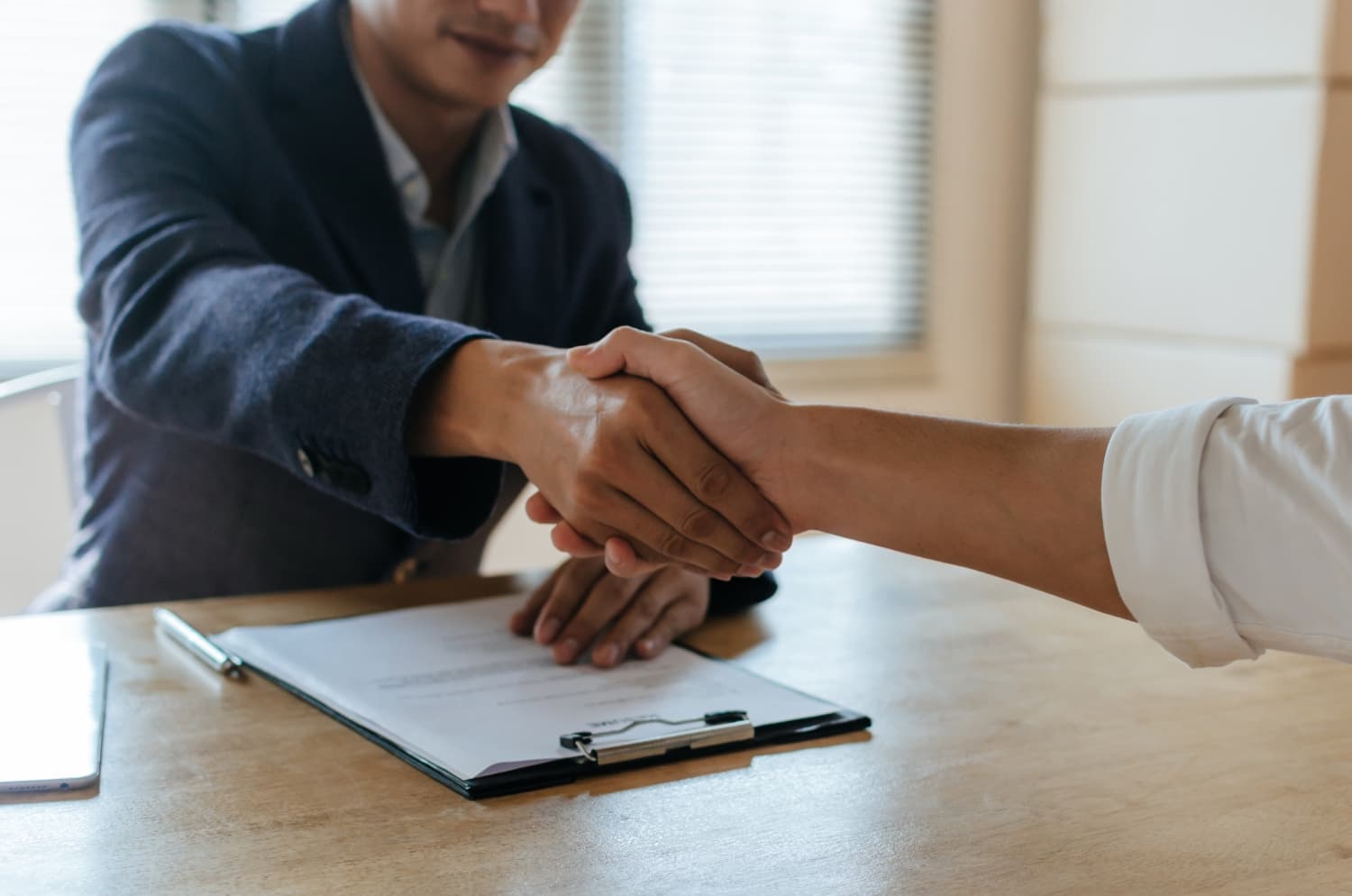 Two people shaking hands